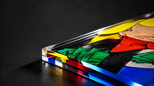 Dramatic side-lit macro view of a 3D acrylic print edge showing layered depth, glossy reflections and glowing electric blue, 