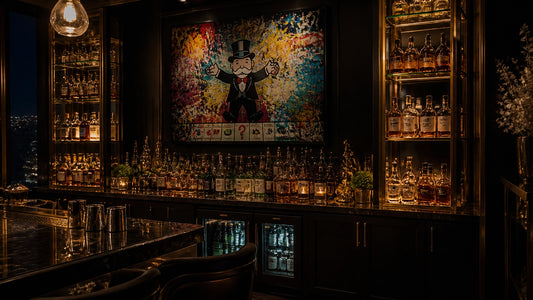 Photoreal dark home bar at night with amber bottle lighting, smoked glass, brass details and a glowing Monopoly-inspired canv