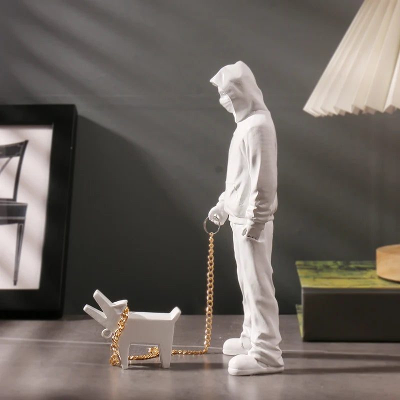 Artistic Man with Dog Sculpture Inspired by Banksy