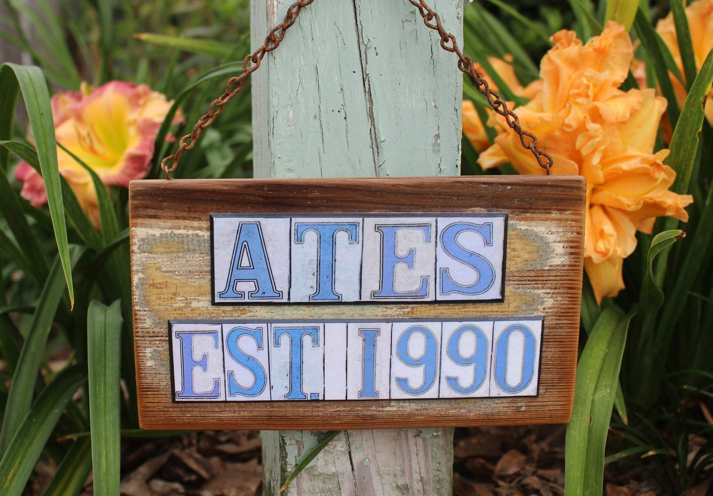 Custom salvage wood Engagement/Wedding sign with a New Orleans street tile them.